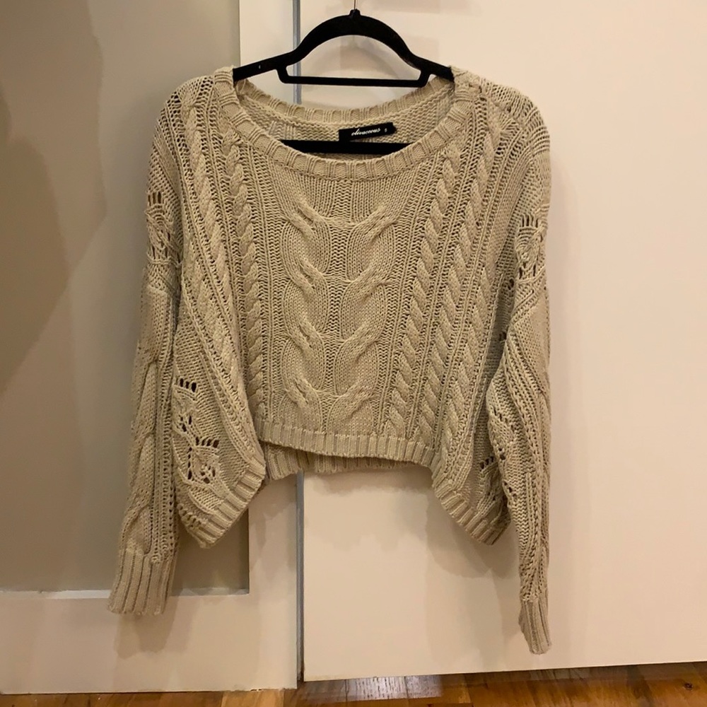 Cropped cable knit sweater